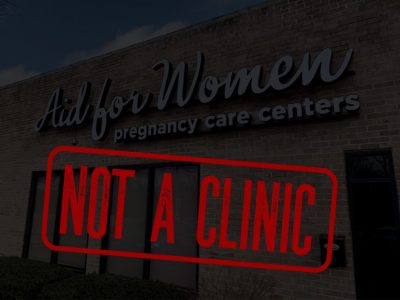 An image of a so-called crisis pregnancy center with a stamp overlaid that reads "not a clinic."