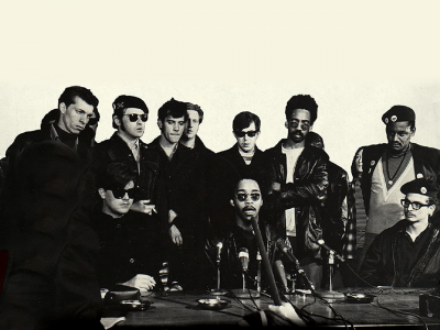 The Black Panthers and Young Patriots at a press conference in the 1960s.
